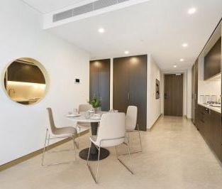 Modern One-Bedroom Apartment Above Mall '88' Offering Ultimate Conv... - Photo 3