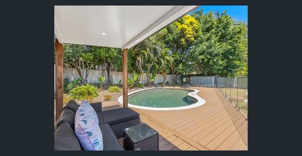 Easy Family Living with Poolside Relaxation in a Prime Location - Photo 1