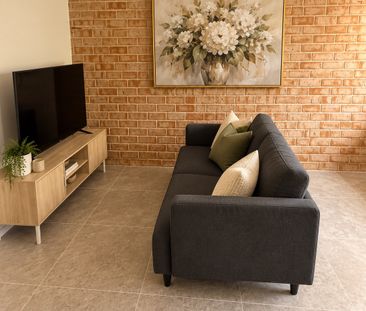 Quality furnished 2 bedroom with bills included in prime location. - Photo 1
