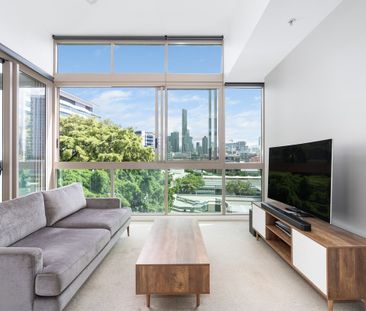 STYLISH ONE-BEDROOM APARTMENT WITH CAPTIVATING CITY VIEWS - Photo 2