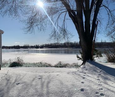 Maison bord de l'eau, superbe vue à Laval, 2 minutes des ponts Mtl - Photo 1