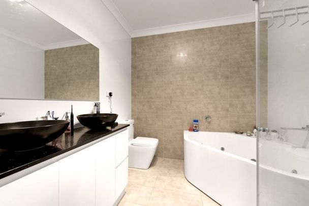 Stylish Four Bedroom Home - Photo 1