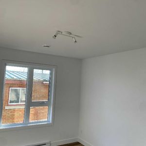 Grands 5½ 2e étage, construction neuve - Photo 2