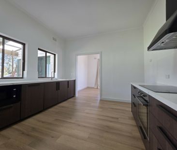 Fully Renovated Home with Stunning City Views - Photo 4