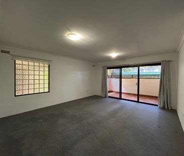 Great size two-bedroom unit in the heart of Riverwood you cannot mi... - Photo 1