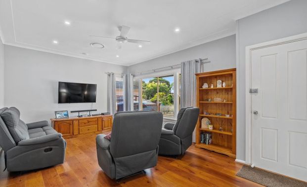 WELL PRESENTED FAMILY HOME IN GREAT LOCATION! - Photo 1