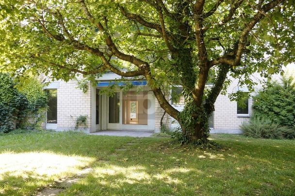 CENTRAL LOCATION WITH GARDEN SEATING AREA - Photo 1