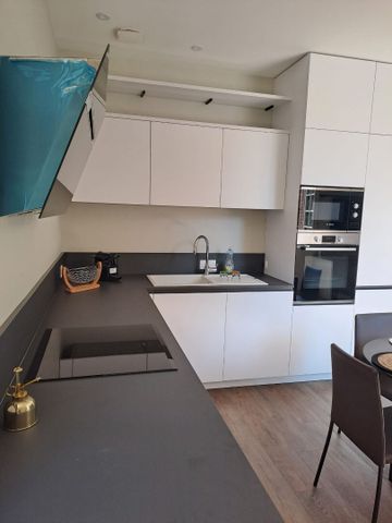 Location Appartement 1 pièce 32m² - Photo 2