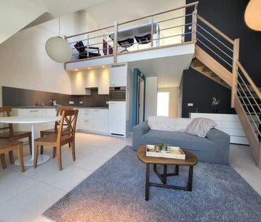 Luxueus dakappartement met 2 slaapkamers en 2 badkamers. - Photo 2