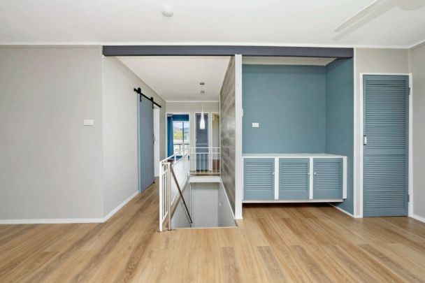 Spacious Dual-Level Home with Pool & Shed in Prime Location - Photo 1