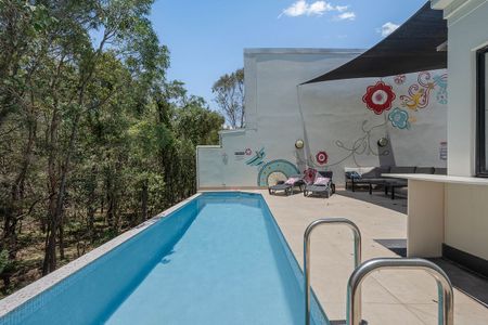 Boutique Three Bedroom ,Three Bathroom Unit in Bushland Setting with Complex Pool - Photo 4