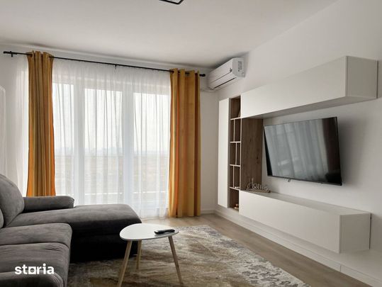 Prima inchiriere - Imobil cu 2 camere si loc de parcare inclus-Maurer - Photo 1