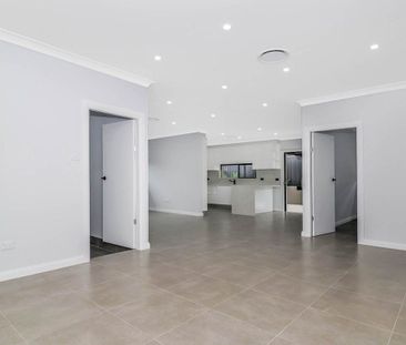 MODERN 4 BEDROOM HOME IN IDEAL LOCATION - Photo 1