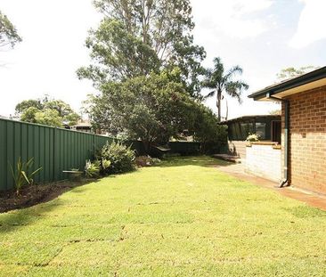 Neat and tidy Family Home- with a perfect yard - Photo 5