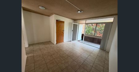 Freshly Painted Two-Bedroom Apartment in a Convenient Location - Photo 2
