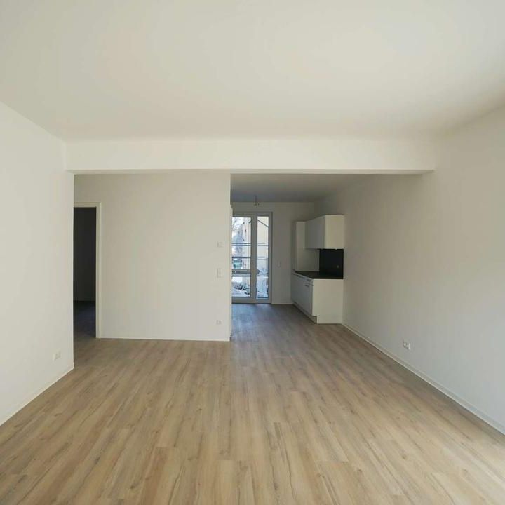 Neubau! Stilvolle 2-Zimmer-Wohnung mit Balkon & Einbauküche im Zentrum-Ost - Photo 1