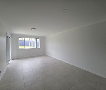 Brand New 3-Bedroom Duplex in Sought-After Taree Estate - Photo 3