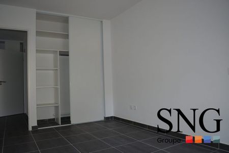 T2 AVEC TERRASSE ET UN PARKNG - Photo 2