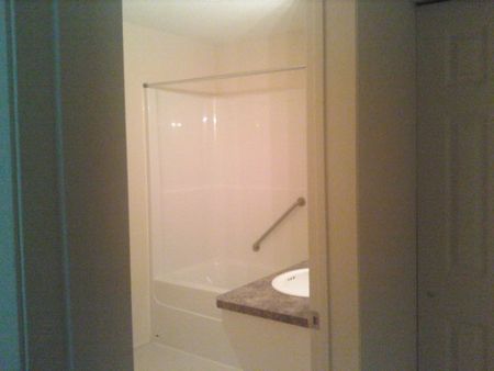 Main Floor 2 Bedroom 1 Bathroom Condo unit - Photo 5