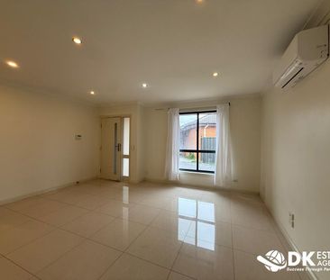 Modern, Low-Maintenance Living in a Convenient Deer Park Location - Photo 5