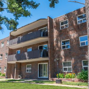 Village Green Apartments - Photo 2