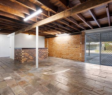 Attractive High-Set with Multiple Living Spaces - Photo 1