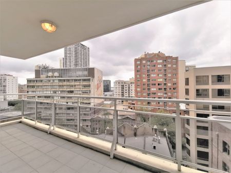 Unfurnished 2 bedroom plus car space for rent in the heart of CBD! - Photo 5