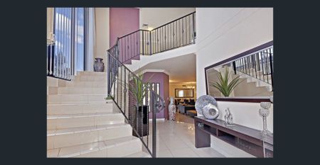 Contemporary 5-Bedroom Residence with Grand Living & Outdoor Elegance - Photo 3