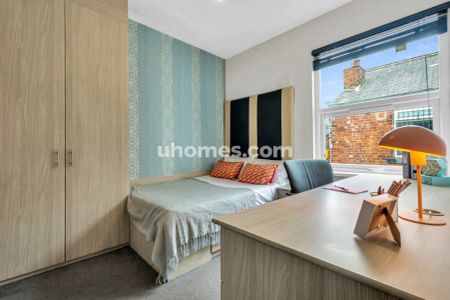 7 Beds 2 Baths - Photo 5
