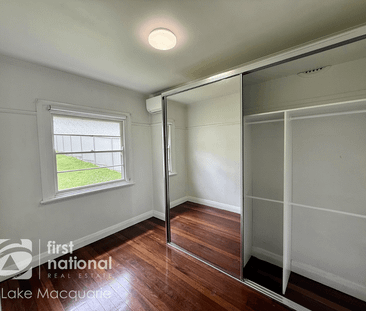 Charming Two-Bedroom Home with Entertaining Deck - Photo 5