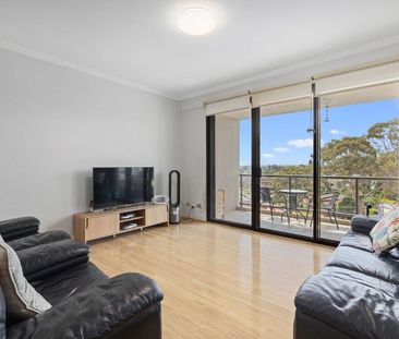 Sleek 2 bedroom apartment in a resort style complex - Photo 1