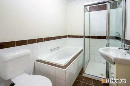 This 5 bedroom townhouse is an absolute must to inspect! - Photo 4