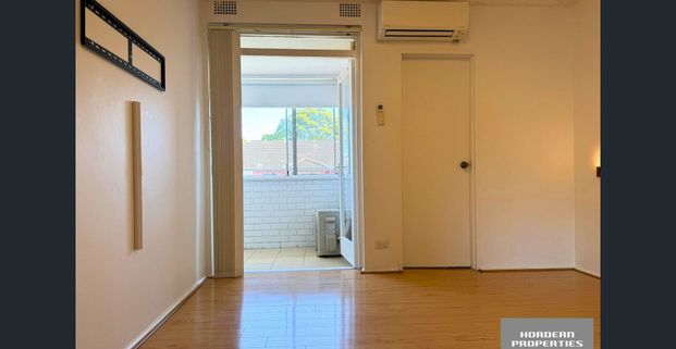 Bright and Airy One Bedroom Apartment with Parking in Prime Eastlakes Location - Photo 1