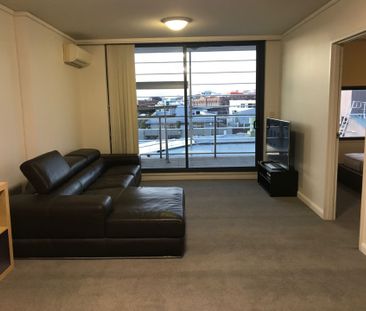 FURNISHED NORTH FACING LIGHT FILLED MODERN ONE BEDROOM APARTMENT IN... - Photo 2