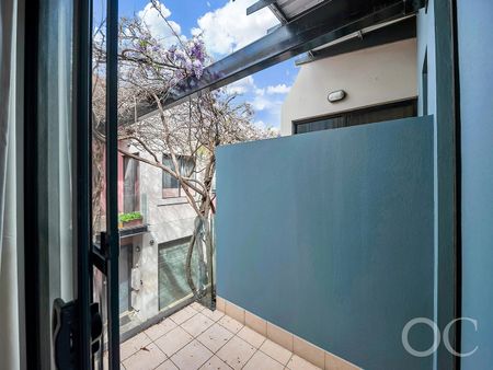 Open the Door to Inner-City Comfort and Contemporary Living - Photo 5