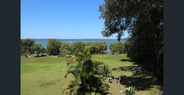 Waterfront Open Plan Home with Solar - Photo 1