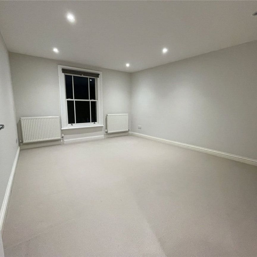 2 bedroom first floor maisonette with private patio and parking, on the High Street. - Photo 1
