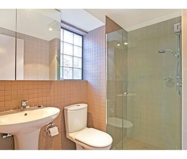 Refined Coastal Living in a Sun-Filled Two-Bedroom Apartment - Photo 4