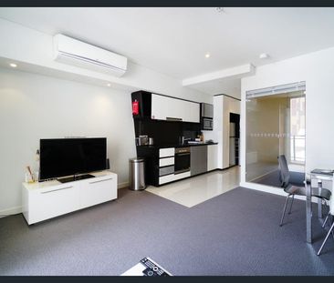 Sky-High City Living - Photo 2