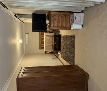 Furnished 3-Bedroom Home - Photo 3