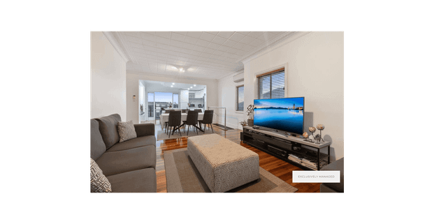 Spacious Family Home with City Views & Dual-Level Living - Photo 1