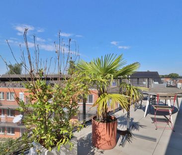 Penthouse met garage op het kerkplein van Melsele! - Foto 4