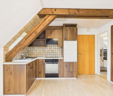 Charmante 2.5-Zimmer-Dachwohnung mit viel Licht und Aussicht - Foto 6