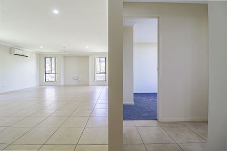 Stylish, Spacious, and Set to Impress - Welcome to 28 Liriope Drive! - Photo 3