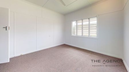 High-set family home in central location - Photo 2