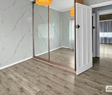 THREE-BEDROOM HOME WITH GARAGE - Photo 6