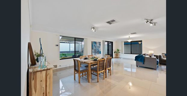 SPACIOUS FAMILY LIVING - 6-MONTH LEASE ONLY! - Photo 1