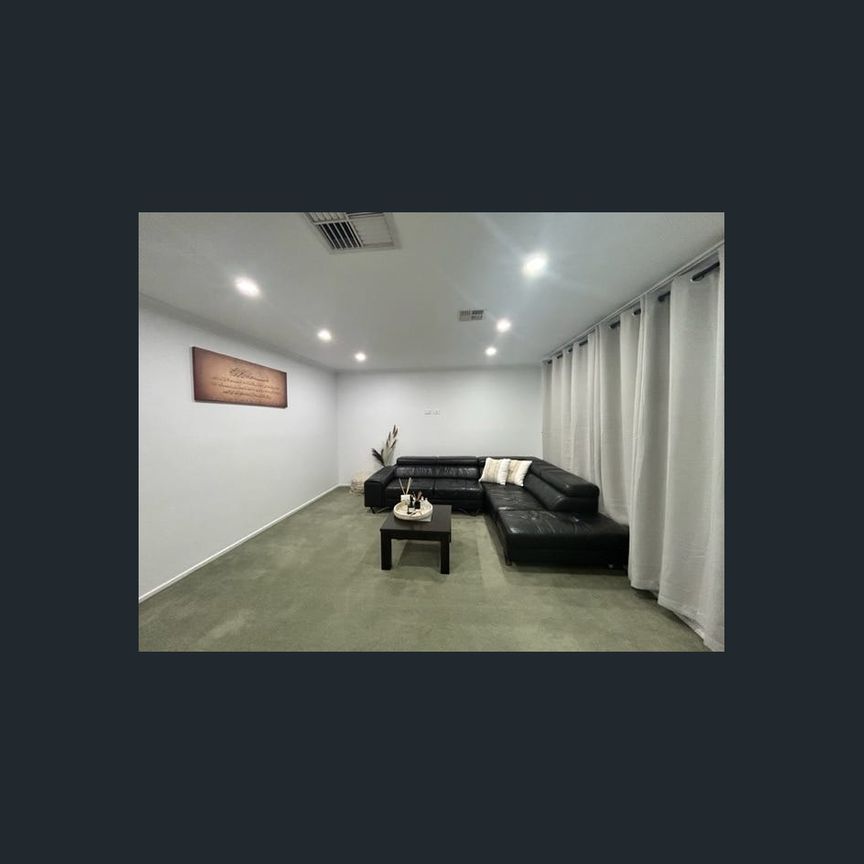 4-Bedroom Family Home with Spacious Backyard - Photo 1