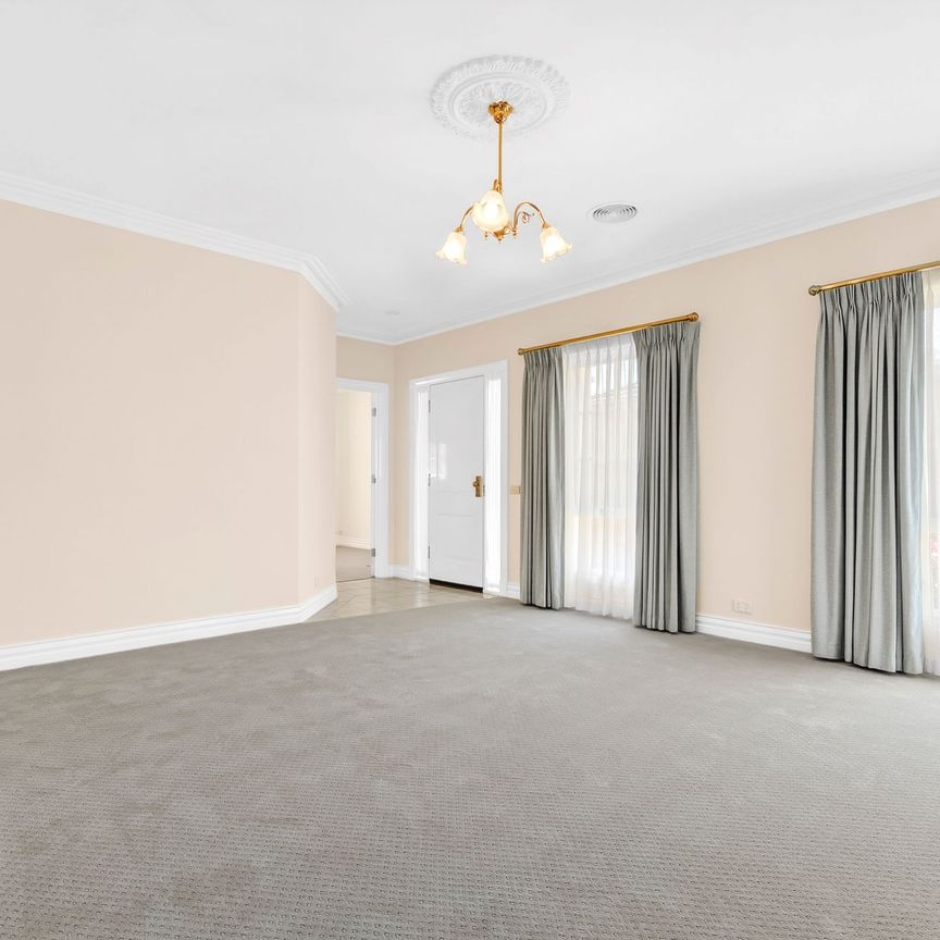 Immaculately Refreshed Home with Garden Maintenance Included in Blue-Chip Belmont - Photo 1