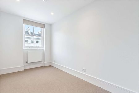 A lovely and bright two bedroom apartment situated on an upper floor of a grand stucco fronted building in Lancaster Gate with a lift - Photo 4